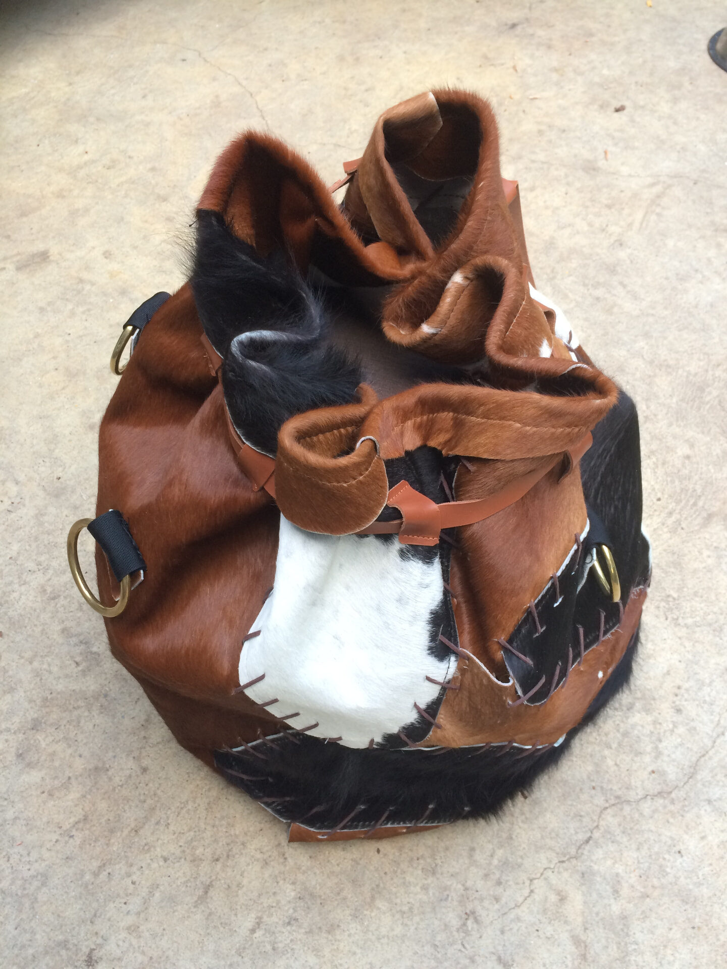 Leather food drop bag prop for I'm a Celebrity laid out in the studio
